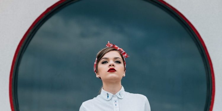 woman wearing white shirt and white skirt