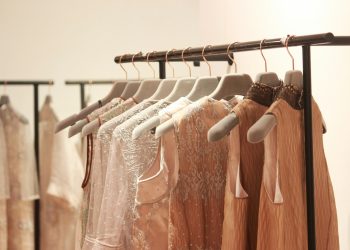 assorted tops hanging indoors