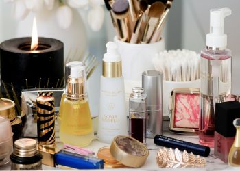 white and gold perfume bottle