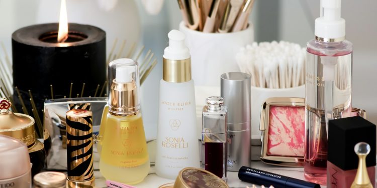 white and gold perfume bottle