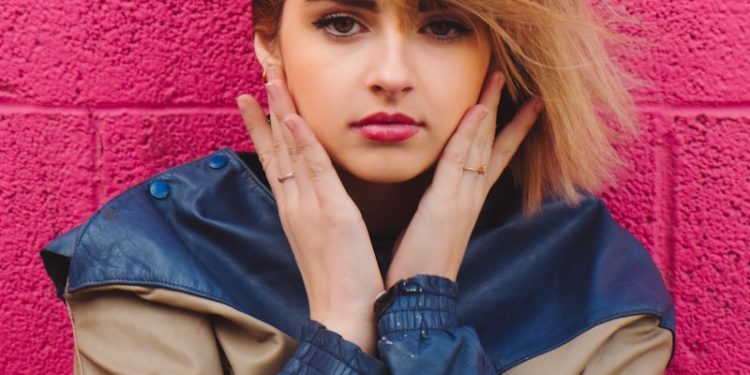 woman in blue and brown jacket